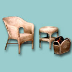 Rattan chair with small table and magazine basket.